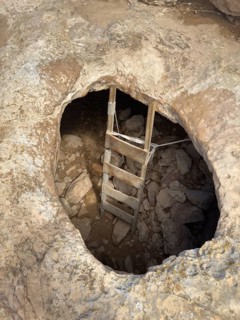 La Cova Foradada cave at the Far de Cap de Barbaria lighthouse on the southern tip of Formentera,