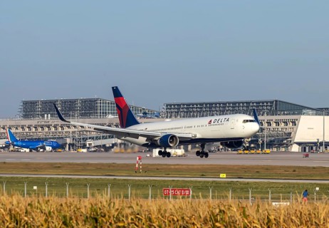 Stuttgart Airport with terminal, Delta Air Lines aircraft landing. Boeing 767-300. Stuttgart
