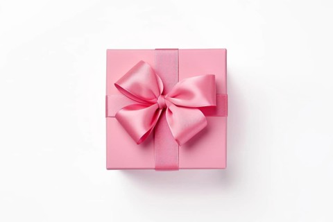Top view of pink gift box with ribbon on white background. KI generiert, generiert AI generated
