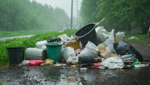 Symbolism, rubbish on the roadside in rainy weather, AI-generated, AI-generated, AI generated