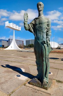 St John the Evangelist statue by Alfredo Ceschiatti and Dante Croce in front of the bell tower of