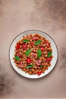 Tuscan pasta with smoked paprika and basil, parmesan cheese, Italian traditional cuisine