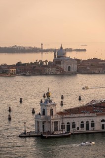 Punta della Dogana and church Chiesa del Santissimo Redentore on the island of Guidecca at sunset,