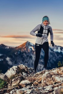 Trail running in autumn on the Jochberg on Lake Walchensee against the wonderful backdrop of the