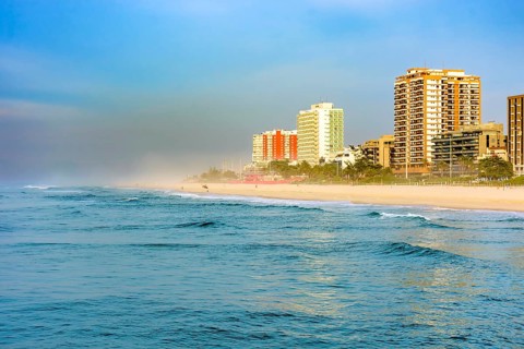 Sunrise on Barra da Tijuca beach seen from the breakwater pier in the city of Rio de Janeiro Rio de