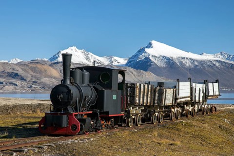 Steam train engine, railway locomotive for transporting coal at former mining town Ny-Alesund,