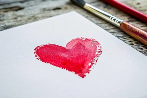 Painted red watercolor heart on white paper. Generative Ai, AI generated