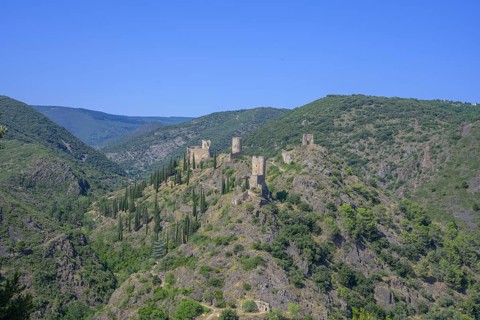View of the hilltop castles Châteaux de Lastours, Lastours, Département Aude, France from the