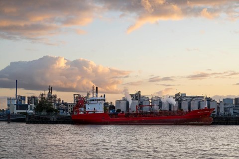 Tanker in front of the oil harbour, evening light, Hamburg, Germany, Europe