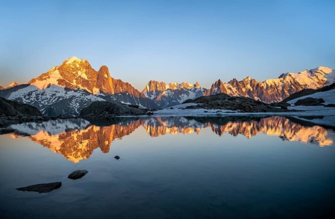 Evening mood, mountain landscape at sunset, alpenglow, water reflection in Lac Blanc, mountain