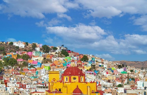 Scenic cobbled streets and traditional colorful colonial architecture in Guanajuato historic city
