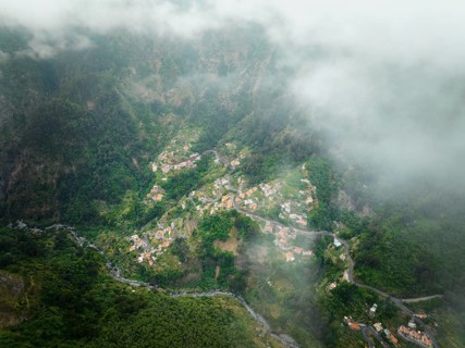 Aerial drone view of Curral das Freiras village in Valley of the Nuns from Miradouro da Eira do
