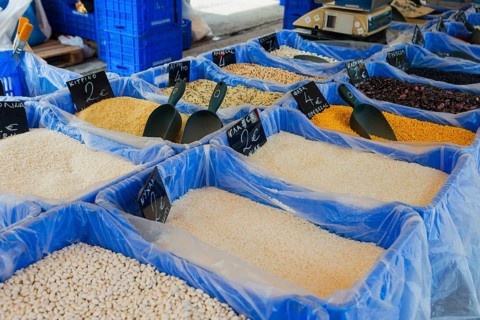 Variety of rice and pulses in large containers at a market, market, Nafplio, Nauplia, Nauplion,