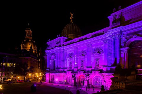 Building of the new Saxon Art Association on Georg Treu Platz, illuminated in colour. With Church
