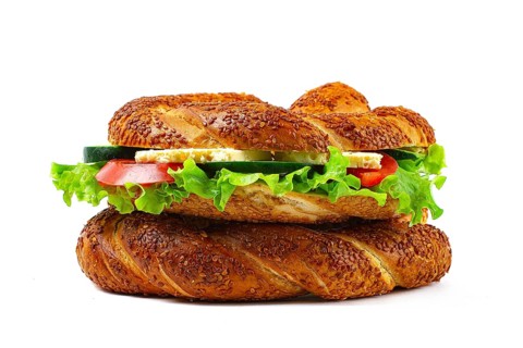 Traditional Turkish bagel simit, breakfast, on a white background, horizontal, no people
