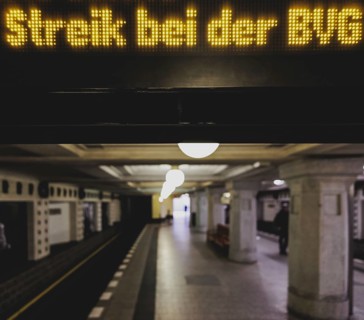 The announcement of a BVG strike is displayed on a display board at Rüdesheimer Platz underground