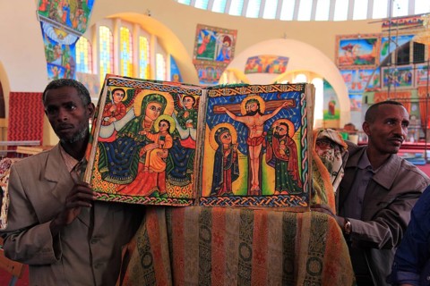 Tigray region, Axum, Aksum, St Mary's Cathedral, Maryam Tsion, inside, church servant shows old