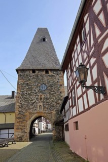 Historic clock tower and landmark, town gate, town tower, street lamp, Herrstein, Hunsrück,