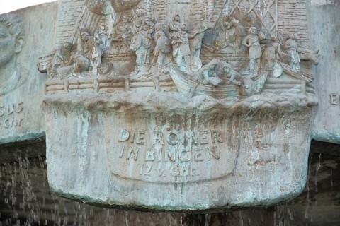 Detail of the ornamental fountain by Karl-Heinz Klein 1981 with relief and inscription The Romans