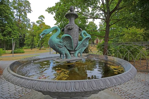 Swan fountain with bowl and swan figure, two, water jet, English Garden, Meiningen, Thuringia,
