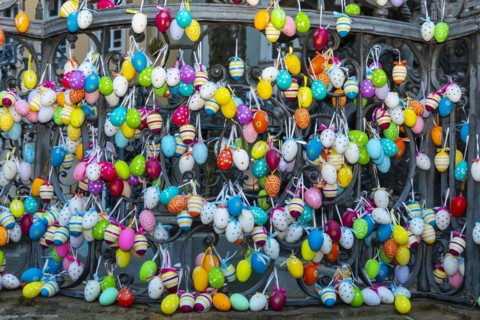 Easter eggs hanging from a fountain railing, Bamberg, Lower Franconia, Bavaria, Germany, Europe