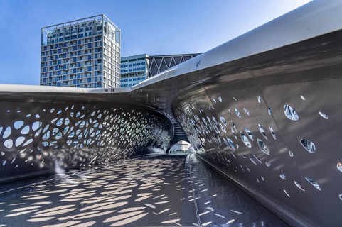 The Parkbruk, cycle and pedestrian bridge in the city centre of Antwerp, crosses a multi-lane city