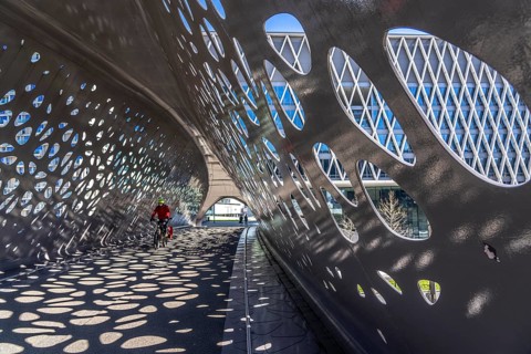 Light effects from the sun in the Parkbruk, a cycle and pedestrian bridge in the city centre of