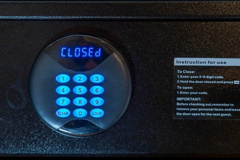 Room safe in a hotel, keypad for entering a 6-digit numerical code to lock the safe for depositing