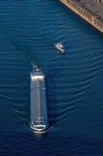 Cargo ship, inland waterway vessel, on the Rhine near Düsseldorf, Rhine knee bridge, water police