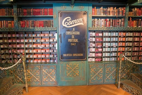 Classic shop with shelves displaying books and colourful preserves in an antique style, decorative