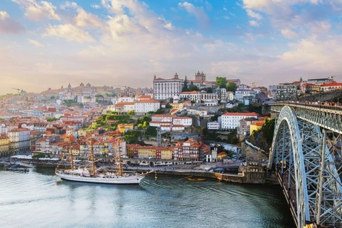 View of Porto city and Douro river and Dom Luis bridge I from famous tourist viewpoint Miradouro do