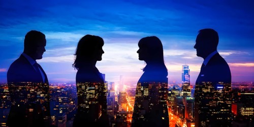 AI generated profile of business professionals with a double exposure of city lights, representing