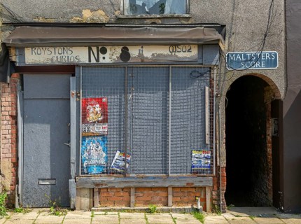 Derelict shop Rosystones Curios, Maltsters Score, High Street, Lowestoft, Suffolk, England, UK