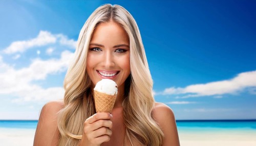 A blonde woman enjoys eating an ice cream cone, AI generated