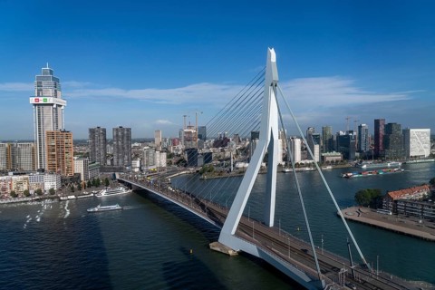 The skyline of Rotterdam, with the Erasmus Bridge over the Nieuwe Maas, Netherlands
