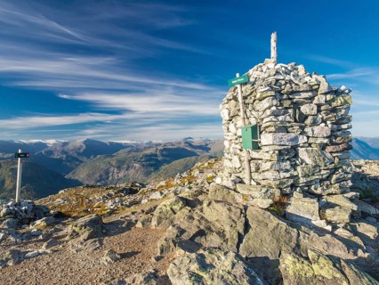 Top of Mt. Molden above the Sognefjord, stone cairn, view towards north, glacier Jostedalsbreen in