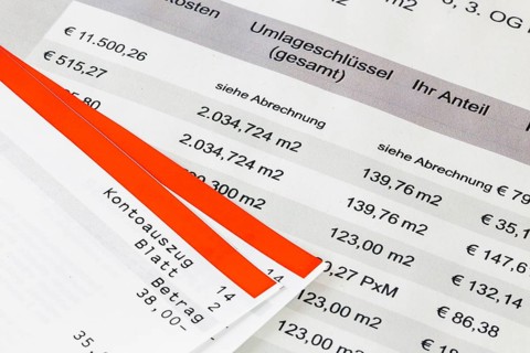 Symbolic image of service charges: Close-up of a symbolic service charge statement