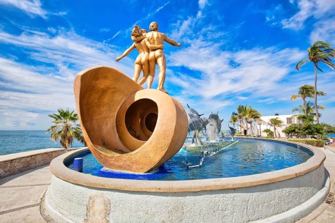 Mazatlan, Mexico-10 December, 2018: Dolphin Statue located on scenic Mazatlan Promenade (Malecon)