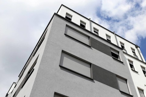 Residential building with modern facade painting (Building with modern facade painting)