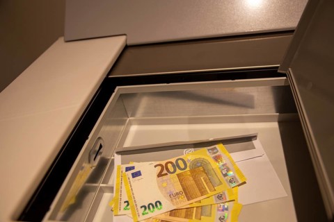 Euro banknotes in a safe deposit box