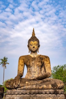 Buddha statue in the central Buddhist temple Wat Mahathat, UNESCO World Heritage Sukhothai