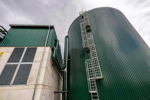 Biogas plant, with hot water storage tank, the gas is produced from various biomass, including