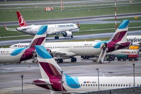 Düsseldorf Airport, Eurowings aircraft on the apron, Turkish Airlines Airbus on the taxiway for