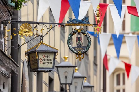 Nose sign in the old town centre of Bamberg. Brewer's star, guild symbol of the brewers.