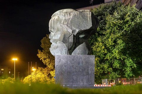 Karl Marx Monument at night. 40 tonne sculpture, the most famous landmark of the city of Chemnitz,