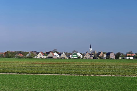 Village view with 600 year old Hoornder church, reformed church, Den Hoorn, Texel, Holland,