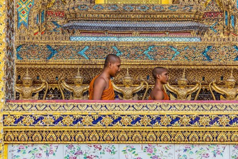 Wat Phra Kaeo temple, royal palace. Royal chapel with Buddhist monks and novices. Bangkok,