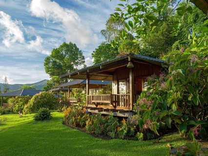 Wooden bungalows in a green garden, Tomohon, Manado, Sulawesi