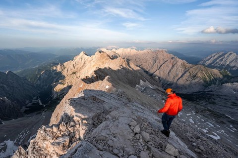 Mountaineers on a steep rocky ridge, impressive mountain landscape, view of the Höllental and the