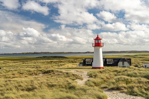 The List West lighthouse on the coast of the Ellenbogen peninsula, List, island of Sylt, district